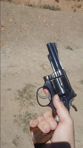 Shooting a classic Smith & Wesson style revolver at the range.