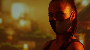 Beautiful ninja girl in a mask and with a katana. Samurai woman on the background of a traditional Japanese temple.