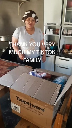 Unpacking Tupperware in a South African Kitchen