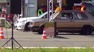 Drag duel between VW Golf 1 and C63 AMG
