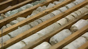 Geological drill core samples in wooden box