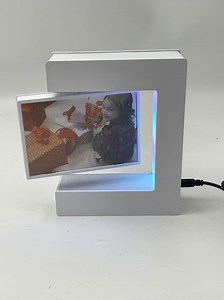 [Hot Item] E Shape Magnetic Levitation Rotating Floating Photo Frame Display Rack with LED Light