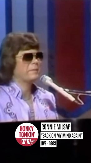 “Back on My Mind Again” is a smooth, bittersweet hit from Ronnie Milsap, released in 1978. With his signature blend of country and pop, Milsap delivers a tale of lingering heartache with effortless charm. The song hit No. 2 on the Billboard Country chart and showcased his rich vocals and piano-driven style. It’s classic late-’70s Milsap—clean production, emotional lyrics, and a hook that sticks with you long after the needle lifts. #country | Truck Stop Country