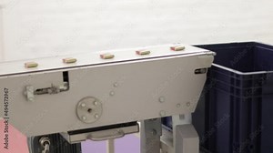 Line for the production of chocolate in an industrial factory. Automatic process in the production line of sweets. Images from the chocolate factory during production. Conveyor belt with sweets.