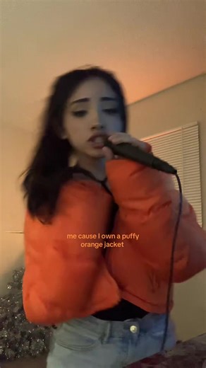 Ariana Grande's Iconic Puffy Orange Jacket