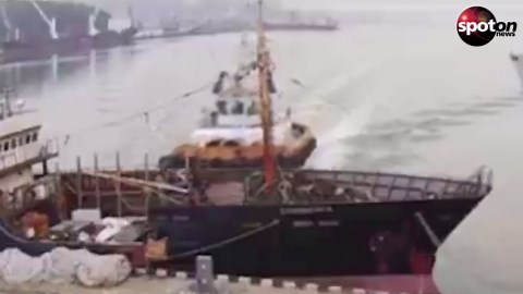 Tug rams fishing boat - and just turns around