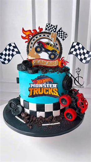 A monster truck hot wheels Cake special for Zakari’s 4th Bday! Link for the topper in my bio:)