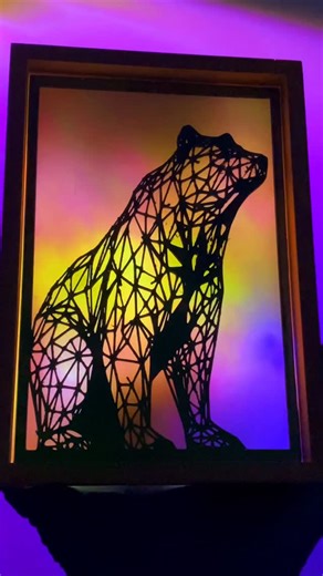 OtticVision Studio on Instagram: "This glowing geometric bear light box is one of those projects that looks different from every angle. I combined a silhouette layer with a color-shifting backlight to create a clean, modern piece of wall decor, would you hang this in your space or gift it to someone? #artoftheday #instaart #homedecor #giftideas #diy"