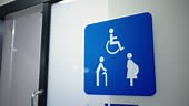 Blue and white modern restroom sign for the public. Toilet signs for...
