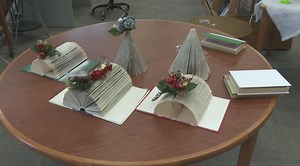 Something old, something yule: St. John's library gives old books new life as Christmas crafts | CBC News