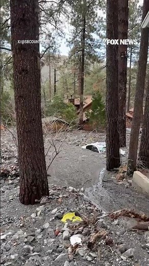 WATCH: Homes and vehicles buried under mud after flash flooding in California