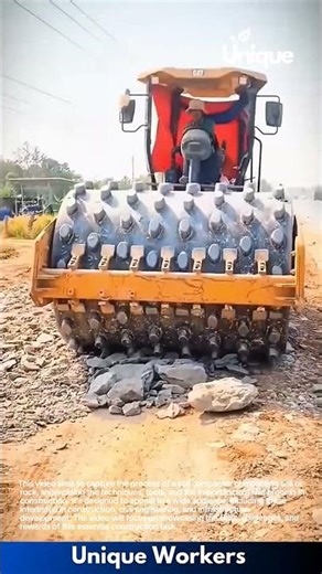 Extreme Road Construction: Heavy Roller Crushes Rocks and Levels Rough Road
