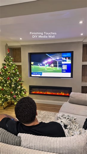Kai Fagan on Instagram: "FINALLY COMPLETED MY DIY MEDIA WALL! So happy what do you guys think? Paint colour - Goodhome Tijuana from @bandq_uk Fire - @amazonuk media wall fireplace TV - Sky Glass @sky_uk"