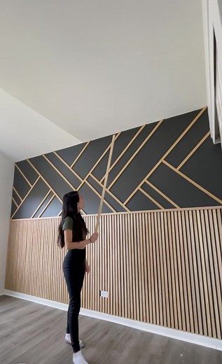 DIY MODERN ACCENT WALL IS FINISHED! First, came the wood slat headboard style wall. ✨ Second, came the modern geometric style wall on top. ✨ I’ll be posting a step by step How to DIY video soon! #diy #accentwall #diyproject #wallpanelling #diyideas