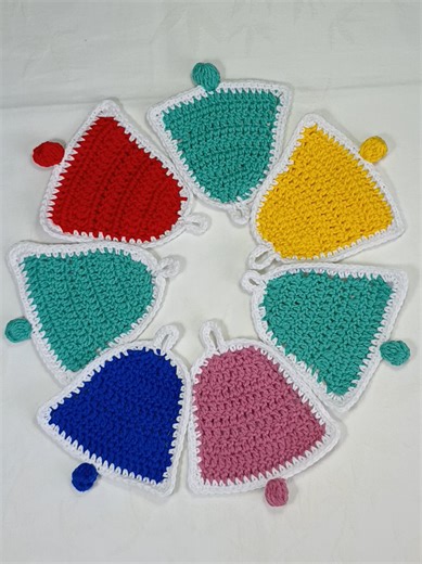 Hi dears! Do you like these beautiful crochet flat bell coasters in different colours? Detailed video tutorial will be soon available at my YouTube Channel Ravella Design. #crochetflatbellgarlandpattern #crochetbellcoasterdesign #crochetbellornaments #crochetflatbellapplique #howtocrochetaChristmasbelleasy