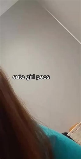 Cute Girl Pose in Turquoise Shirt