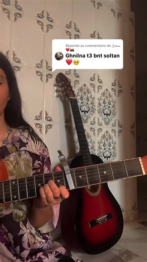 Réponse musicale à سماح avec guitare acoustique