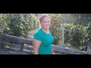 Woman castrating a pig with just one cut