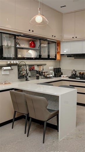 N E S T I N on Instagram: "•Modular kitchen • Beige kitchens are a popular trend for 2025, offering a warm, timeless, and sophisticated alternative to cooler neutrals like white or gray. The color is incredibly versatile, pairing well with various design styles and materials. P011 2k25 Project: Residential at kadungathkundu,Malappuram Client: Mr faisal achath & Mrs Sahadiya Area : 2,450 sqr ft Contact @nestin_design_studio for more details +91 9946181212 • • • #modularkitchen #beigecolor #interi