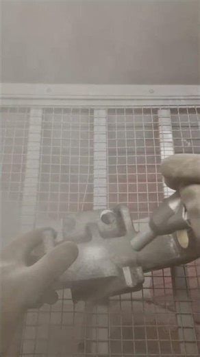 Glass bead blasting of a motorcycle part