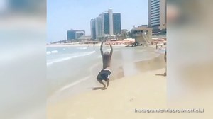 Chris Brown makes several back flips before missing his landing