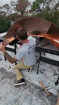 Fabricating a copper barrel dormer roof.