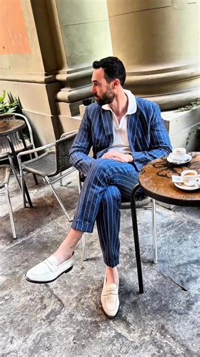 Jonathan’s look proves you don’t have to choose between sharp and laid-back. This custom blue pinstripe suit paired with a Cuban collar shirt brings a modern twist to classic tailoring. 🧵 Made to his exact measurements 🎯 Styled for warm-weather elegance Explore more unique suit combinations at Hockerty. 👉 https://www.hockerty.com/en-us/mens-outfits/3019-blue-pinstripe-suit-white-cuban-collar-shirt/ | Hockerty