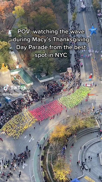 Color Guard and Marching Band Wave at Macy's Thanksgiving Day Parade