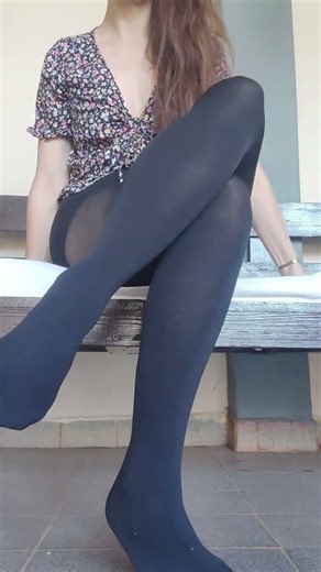 Crossing Legs in Black Nylon