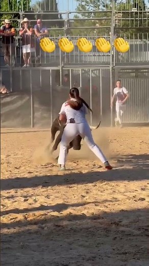 Brave Woman Dodges Wild Bull in Daring Spanish Bullfighting Move
