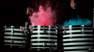 Super slow motion of drummer banging on drums with colored powder explosion. Filmed on high speed cinema camera, 1000 fps. Stock Video