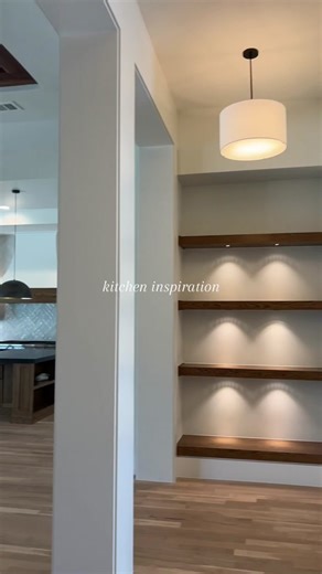 Kitchen Inspiration🍴✨ This custom-built kitchen turned out amazing! We love the dark island paired with the white cabinets! . . . #kitcheninspiration #homeinspiration #custombuild #hometour