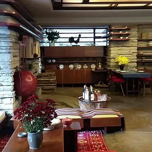 A quick stroll through the living room before the next tour. Are you visiting us soon? | Fallingwater