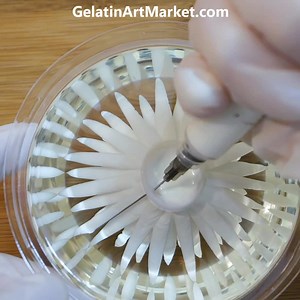 Delicious Easter jelly made with fruit-flavored jelly and cream filled Easter eggs. Anyone can learn: GelatinArtMarket.com | Gelatin Art Market