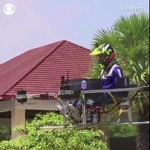 Inspired at first by a desire to beat their city's notorious traffic, a group of Cambodian students has designed a prototype drone they hope can eventually be used to ferry people around Phnom Penh and help fight fires. | CBS News