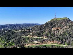 Hollywood Sign and Hiking Trail Overlooking Los Angeles – 4K Aerial Footage