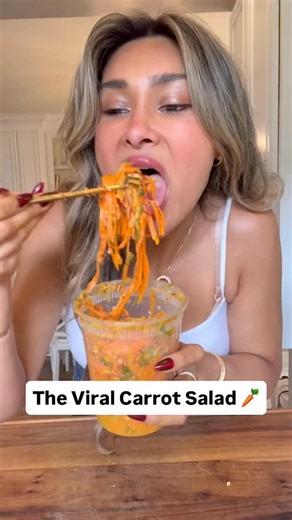 MY MOST VIRAL VIDEO OF 2025!! 🔥🔥🔥 VIRAL CARROT CHICKEN SALAD! 🥕 🥗🥗 If you haven’t tried this yet, you need to! 🤤 this is how I make it high protein and it’s amazing 🥰 Ingredients: 4-5 large carrots, ribboned 1/4 red onion, sliced 1/4 cup chopped green onion 1/4 cup chopped cilantro 2 garlic cloves, grated Chicken (I used 1 chicken breast, diced and cooked) 2 tbsp soy sauce 3 tbsp rice vinegar 2 tbsp toasted sesame oil 2 tsp honey or sweetener 2 tbsp sesame seeds 1 tbsp chili oil 1/3 cup