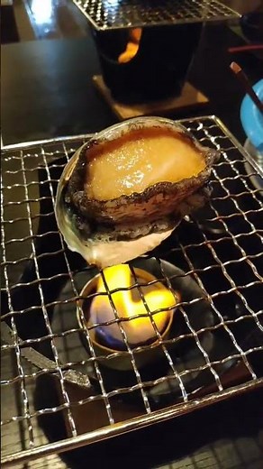 Live Cooking Of Fresh Abalone At Kaiseki Dinner At Nagomi No Lida Ryokan In Shakotan Hokkaido Japan
