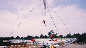 Jumping on a trampoline suspended 100 ft in the air