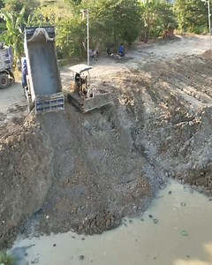 34K views · 281 reactions | Nice Job!! Small Bulldozer Pushing Mud Filling A Lake With 5T Dump Trucks Loading Into Water | Bulldozer City | Facebook