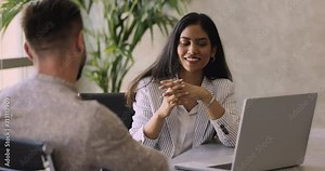 Two business partners discuss cooperation meet in company office, talking seated at table, express opinion, share ideas and thoughts, solving common business. Negotiations, consultation, mentorship