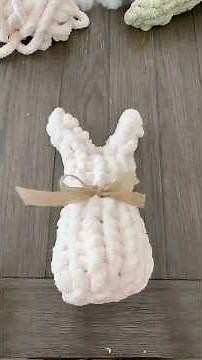 This adorable stuffed bunny tutorial is available at www.wildlywoven.store #handknitting #crochet