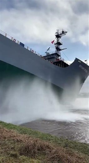 Fast-moving estuary currents interact with a ship launch