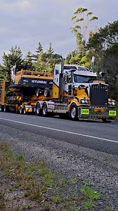 5.7K views · 118 reactions |  Porters Kenworth T909 Heavy Haul Unit rolls north under lights with a forestry excavator onboard  #dhub24 #northlandtruckers #heavyhaul | DriveHub Northland | Facebook