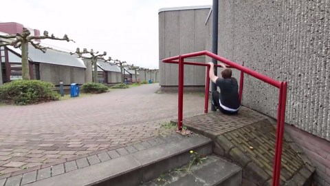 Parkour Guy Jumps and Swings on Rails