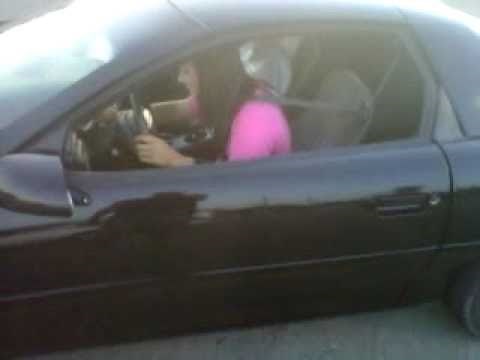 Girl trying to start Camaro SS