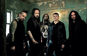 Korn members jam with Korn tribute band on stage—watch