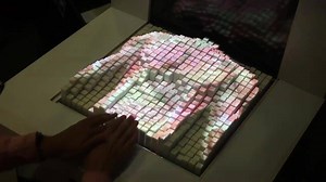 MIT's latest tangible interface? Shape-shifting digital clay Unveiled over the weekend at the CHI 2016 conference, MIT's Tangible Media Group calls this new functionality the Materiable platform. Materiable gives the Inform the ability to mimic the tactile qualities of real-world materials, like rubber, water, sand, and more. Depending on the settings, flicking the surface of an Inform might make all of its pixels ripple, or quiver like jelly, or even bounce like a rubber ball. It's all accompli