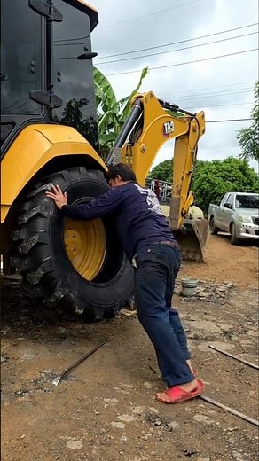 How to Change a Massive Tractor Tire Solo Unbelievable Strength! #shorts