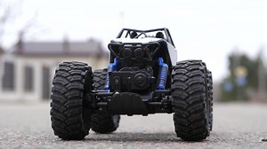 close-up of a radio-controlled car driving to the starting point